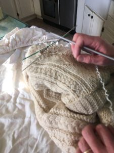 Mending an Aran sweater
