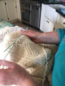 Checking knitting repair work