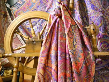 Silk scarf and spinning wheel
